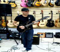 Aulas de violao,guitarra, baixo ,canto ,teclado e percussao