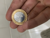 Moeda 50 anos verso invertido