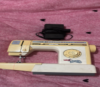 Máquina de costura singer